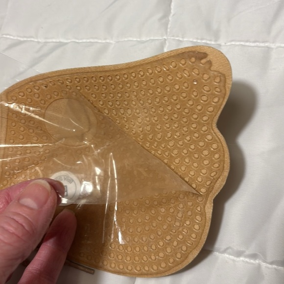 Cleavage Pal Backless and Strapless
Adhesive Lace Up Bra - Picture 8 of 9